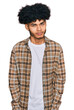 © Krakenimages.com - Young african american man with afro hair wearing casual clothes skeptic and nervous, frowning upset because of problem. negative person.
