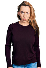 Poster - Young caucasian woman wearing casual clothes skeptic and nervous, frowning upset because of problem. negative person.