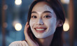Close up beauty girl with freckles and thick eyebrows, applying moisturizing skincare cream, lotion or mask for skin lifting and anti-aging detoxifying effect, white background.