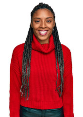 Wall Mural - African american woman wearing casual winter sweater with a happy and cool smile on face. lucky person.