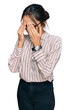 © Krakenimages.com - Young hispanic girl wearing casual clothes and glasses rubbing eyes for fatigue and headache, sleepy and tired expression. vision problem