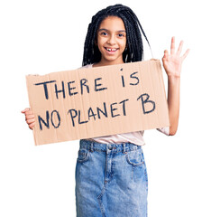 Wall Mural - Cute african american girl holding there is no planet b banner doing ok sign with fingers, smiling friendly gesturing excellent symbol