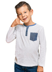 Sticker - Adorable caucasian kid wearing casual clothes smiling doing phone gesture with hand and fingers like talking on the telephone. communicating concepts.