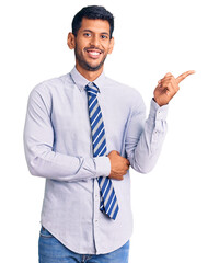 Sticker - Young latin man wearing business clothes smiling happy pointing with hand and finger to the side