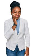 Poster - Young african american woman wearing business clothes touching mouth with hand with painful expression because of toothache or dental illness on teeth. dentist