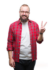 Sticker - Young caucasian hipster man wearing glasses over isolated background smiling with happy face winking at the camera doing victory sign. Number two.