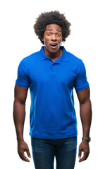 Sticker - Afro american man over isolated background afraid and shocked with surprise expression, fear and excited face.