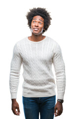 Poster - Afro american man over isolated background smiling looking side and staring away thinking.