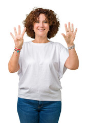 Sticker - Beautiful middle ager senior woman wearing white t-shirt over isolated background showing and pointing up with fingers number nine while smiling confident and happy.