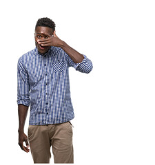 Poster - Young african american man wearing blue shirt peeking in shock covering face and eyes with hand, looking through fingers with embarrassed expression.