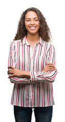 Canvas Print - Beautiful young hispanic woman happy face smiling with crossed arms looking at the camera. Positive person.