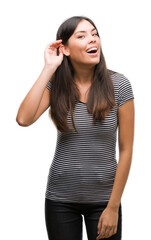 Poster - Young beautiful hispanic woman smiling with hand over ear listening an hearing to rumor or gossip. Deafness concept.