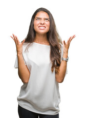 Sticker - Young beautiful arab woman over isolated background crazy and mad shouting and yelling with aggressive expression and arms raised. Frustration concept.