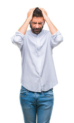 Wall Mural - Adult hispanic man over isolated background suffering from headache desperate and stressed because pain and migraine. Hands on head.