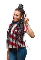 Sticker - Young braided hair african american girl over isolated background showing and pointing up with fingers number two while smiling confident and happy.