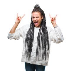 Sticker - Young braided hair african american girl wearing sweater over isolated background shouting with crazy expression doing rock symbol with hands up. Music star. Heavy concept.