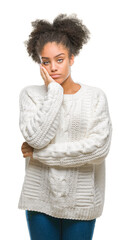 Sticker - Young afro american woman wearing winter sweater over isolated background thinking looking tired and bored with depression problems with crossed arms.