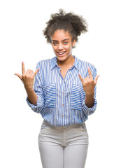 Poster - Young afro american woman over isolated background shouting with crazy expression doing rock symbol with hands up. Music star. Heavy concept.