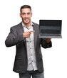 © Krakenimages.com - Handsome young man using computer laptop very happy pointing with hand and finger