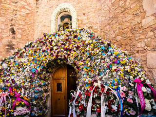 Wall Mural - Religious offering of flowers during the Patron Saint and Moors and Christians Festivities in honor of Loreto Virgin of Santa Pola, Alicante, Valencian Community, Spain.