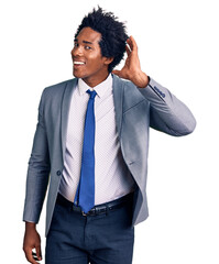 Canvas Print - Handsome african american man with afro hair wearing business jacket smiling with hand over ear listening an hearing to rumor or gossip. deafness concept.