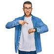 © Krakenimages.com - Young caucasian man wearing casual clothes in hurry pointing to watch time, impatience, upset and angry for deadline delay