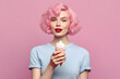 © VK Studio - Young woman with red lips, pink hair holds ice-cream. Makeup beauty products ad. Generative AI