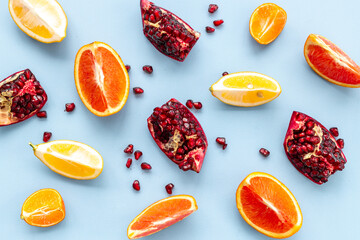 Canvas Print - Creative flatlay layout of juicy pomegranate and citrus