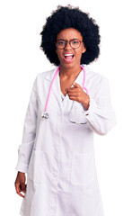 Poster - Young african american woman wearing doctor coat and stethoscope pointing displeased and frustrated to the camera, angry and furious with you