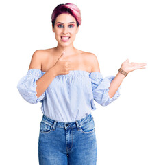 Sticker - Young beautiful woman with pink hair wearing casual clothes showing palm hand and doing ok gesture with thumbs up, smiling happy and cheerful