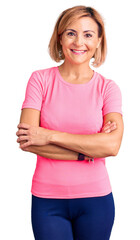 Poster - Young blonde woman wearing sportswear happy face smiling with crossed arms looking at the camera. positive person.