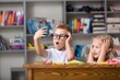 © BillionPhotos.com - School boy dreaming with alarm clock in classroom