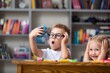 © BillionPhotos.com - School boy dreaming with alarm clock in classroom