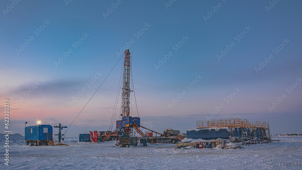 Frost Rig Well repair at a gas field in the Arctic. Winter polar day. Frost. Snow ...