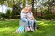 © BillionPhotos.com - Schoolchilds hugging in park. Back to school concept.