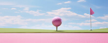 Pink Golf Ball In Green Field With Blue Sky Background.