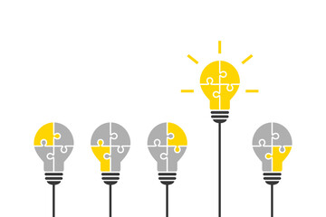 Wall Mural - light bulb made of jigsaw puzzle pieces as smart and outstanding idea concept. standing out, good th