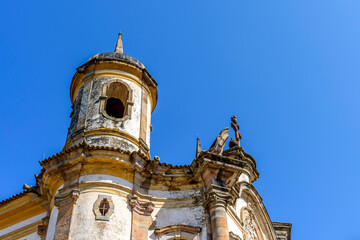 Wall Mural - Tower and facade of a historic baroque church in the city of Ouro Preto in Minas Gerais