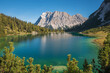clear blue alpine lake Seebensee and Zugspitze mountain, austria