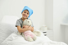 Childhood Cancer. Girl With Toy Bunny In Hospital