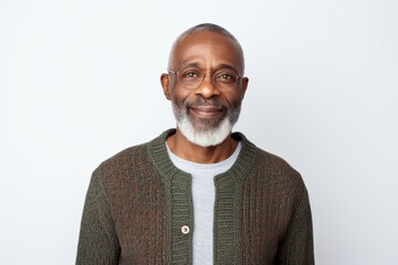 Wall Mural - Portrait of smiling mature Indian man in eyeglasses looking at camera