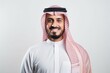 © Anne Schaum - Portrait of a handsome arabian man smiling over white background