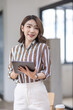 © David - Business, finance and employment, female successful entrepreneurs concept. Confident smiling asian businesswoman, office worker in office holding tablet, help clients