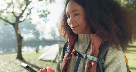 Wall Mural - Phone, forest and woman camping, search for location and internet connection or social media chat in nature. African person or camper at lake, hiking and outdoor networking on mobile or typing online