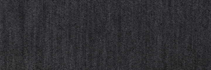 Sticker - Black jeans texture or background, denim textile.