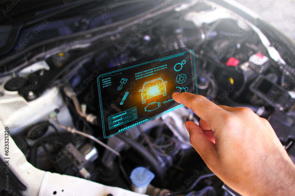 Auto mechanic checking ECU engine system with OBD2 wireless scanning ...