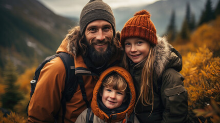 Happy family father and daughter in the mountains