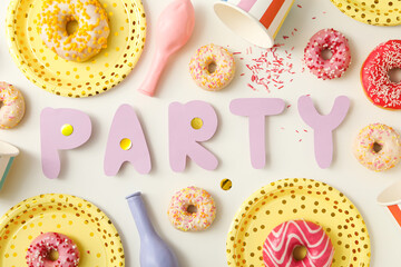 Donuts,  plates, balloons and word party on white background