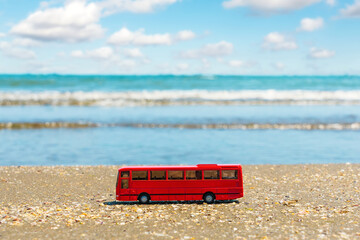 Tourist bus on the sea shore. Summer vacation