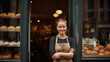 © PaulShlykov - business owner with bakery shop background